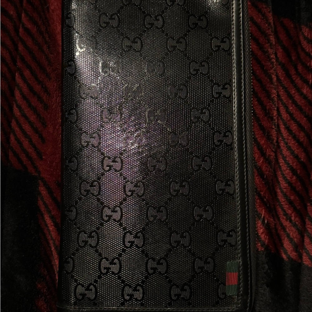Gucci Black Wallets with Iconic Monogram Pattern